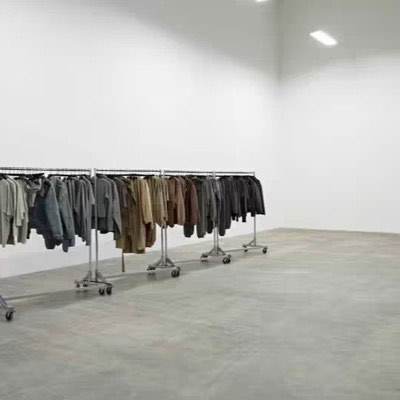 A rail of sample jackets in an empty studio