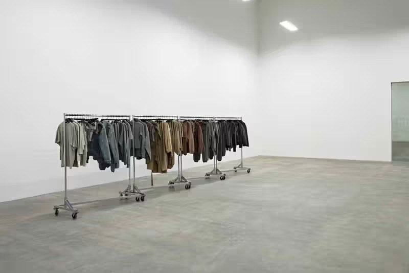 A rail of sample jackets in an empty studio